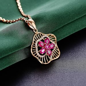 bijou doré, collier doré, pendentif en forme de fleur gemme rose